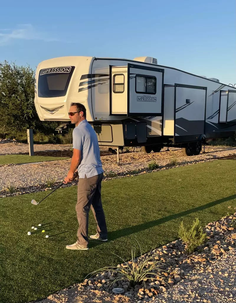 man playing golf at RV park